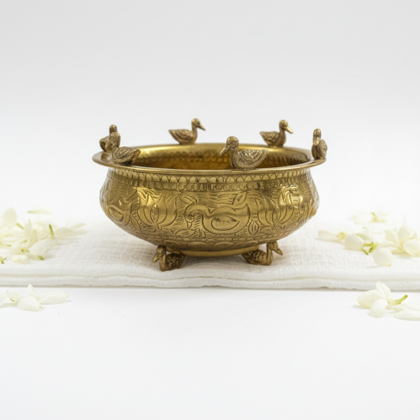 The Brass Duck Uruli is a cultural artefact and decorative metal bowl that serves as a standalone art piece and conversation starter, bringing traditional charm and timeless beauty to your home.